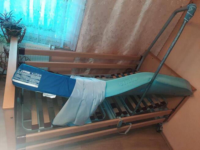 Łóżko reha. regulowane elek., materac przeciwodleżyn. System