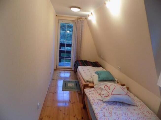 Syndyk sprzeda udział 1/2 w zabudowanej działce