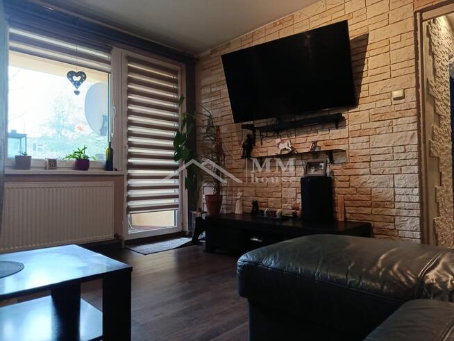 Mieszkanie na parterze z ogrodem i garażem .