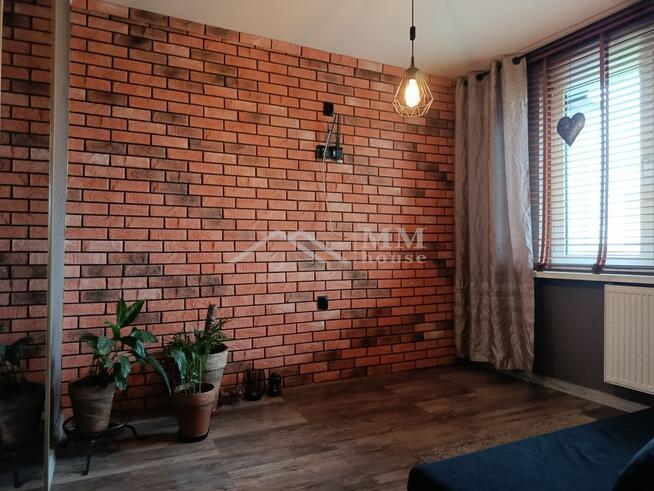 Mieszkanie na parterze z ogrodem i garażem .