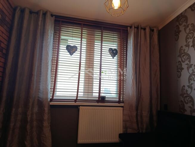 Mieszkanie na parterze z ogrodem i garażem .