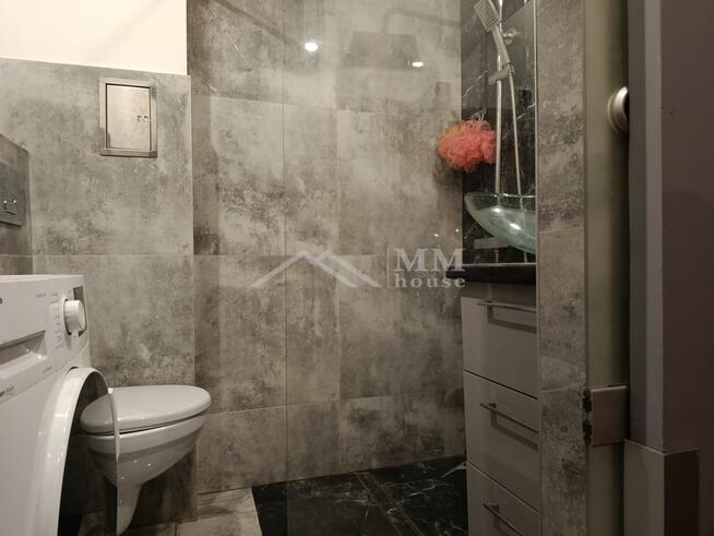 Mieszkanie na parterze z ogrodem i garażem .