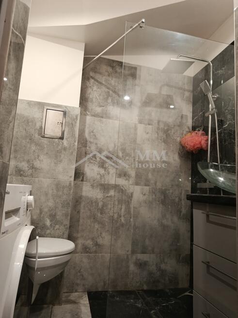 Mieszkanie na parterze z ogrodem i garażem .