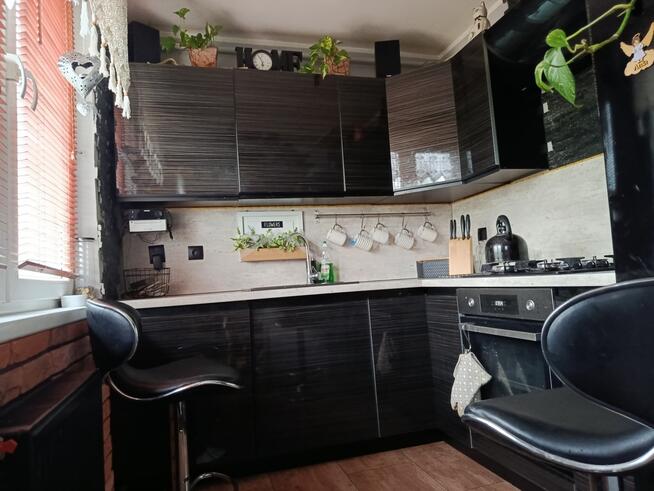 Mieszkanie na parterze z ogrodem i garażem .