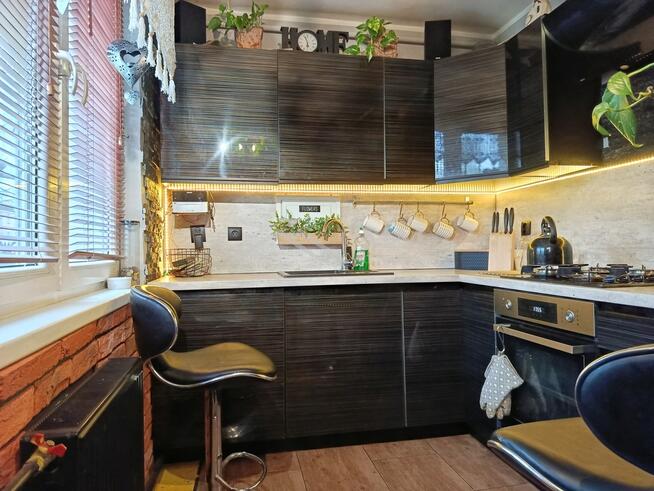 Mieszkanie na parterze z ogrodem i garażem .