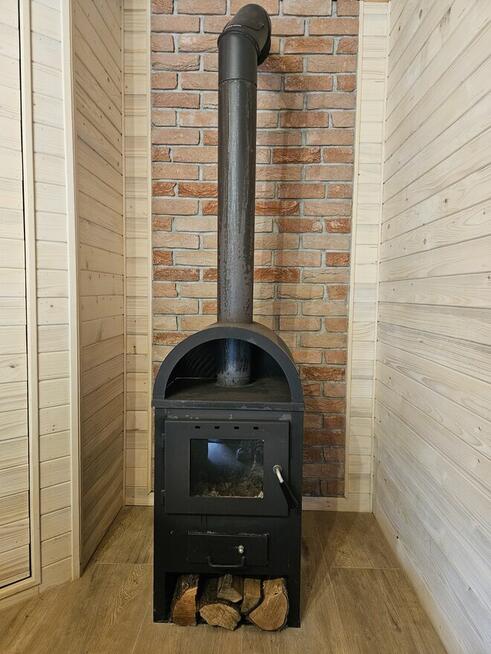 Ogródek działkowy z całorocznym domkiem drewnianym