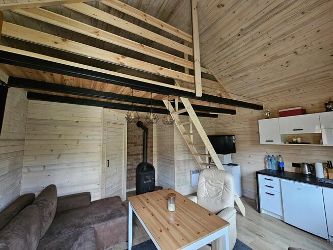 Ogródek działkowy z całorocznym domkiem drewnianym