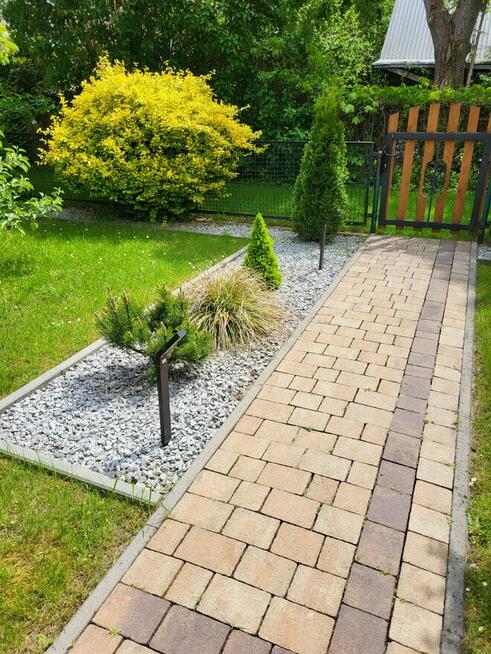 Ogródek działkowy z całorocznym domkiem drewnianym