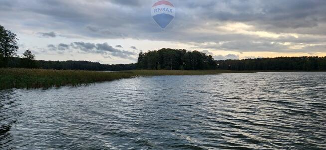 Działka budowlana z linią brzegową, Skolity