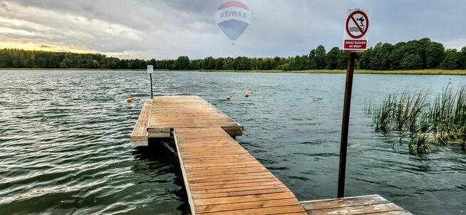 Działka budowlana z linią brzegową, Skolity