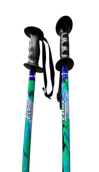 Narty zjazdowe z wiązaniami Tyrolia i kijkami Elan