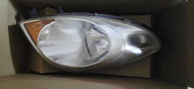 Nissan NOTE E11 - Reflektory, komplet lamp przednich