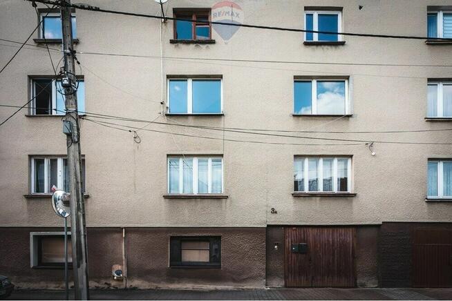 Mieszkanie z ogródkiem i budynkiem gospodarczym