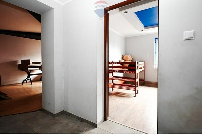 Mieszkanie z ogródkiem i budynkiem gospodarczym