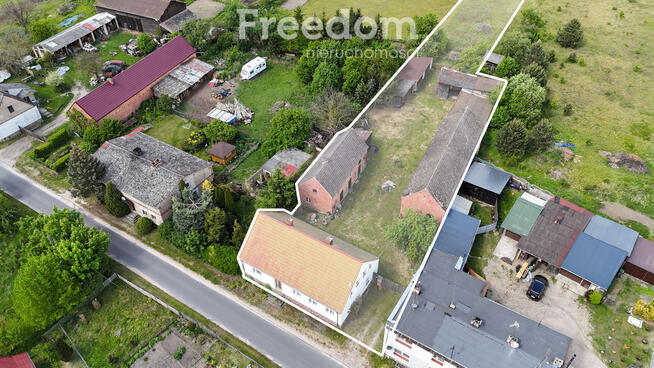 Dom w Krępsku z zabudowaniami gospodarczymi