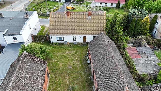 Dom w Krępsku z zabudowaniami gospodarczymi