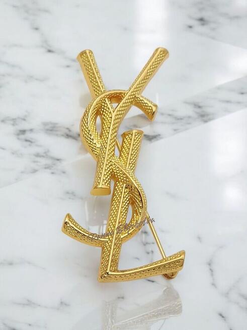 Broszka YSL Yves Saint Laurent złota 7cm