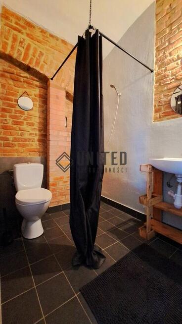 Dom - część mieszkalna z lokalami inwestycyjnymi