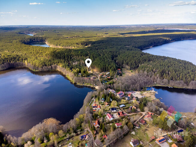Działka budowlana przy lesie nad jeziorem Łajskim