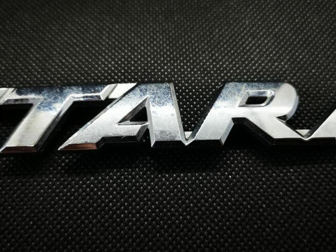 Emblemat napis VITARA Suzuki Vitara III 2015- LY 77831-54P00