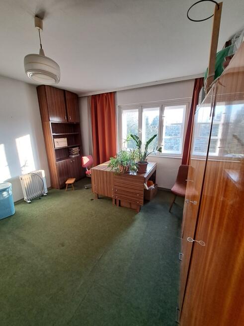 Dom do remontu w dzielnicy Ogrodów, 151 m², garaż.