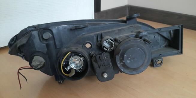Nissan Primera P11 reflektor lampa przednia lewa EU lift