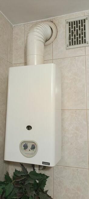 piec dwufunkcyjny 25 kW.