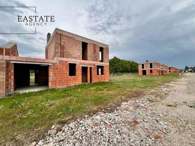 Bliźniak w stanie surowym otwartym/działka 500 m2