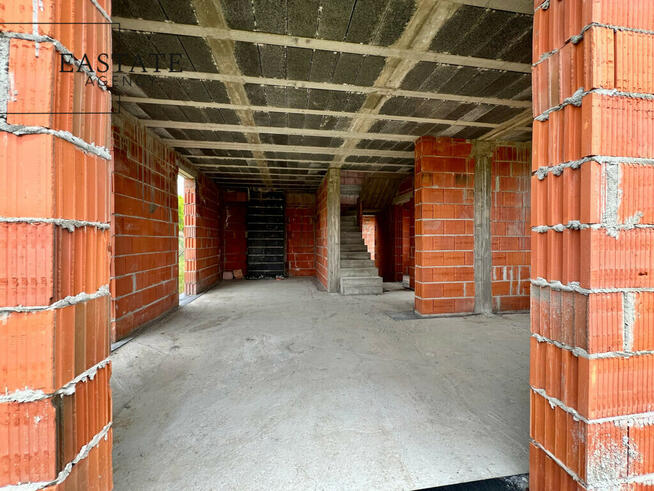 Bliźniak w stanie surowym otwartym/działka 500 m2