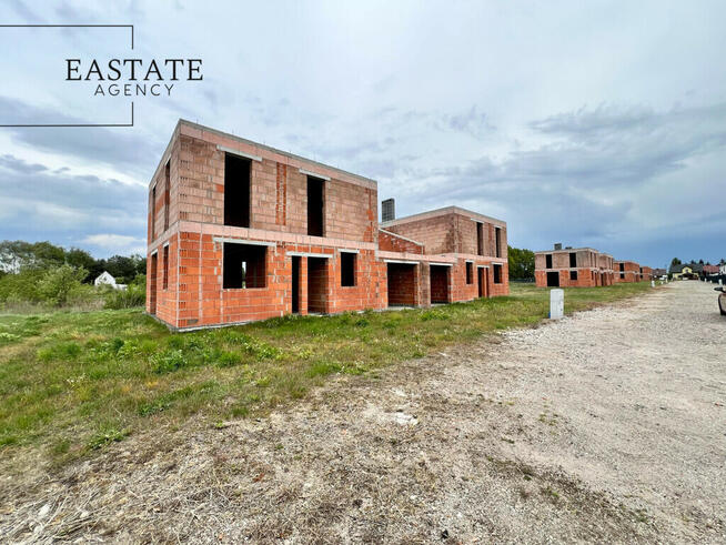 Bliźniak w stanie surowym otwartym/działka 500 m2