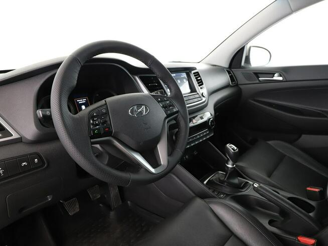 Hyundai Tucson skóra navi PDC grzane fotele tempomat klima-auto.
