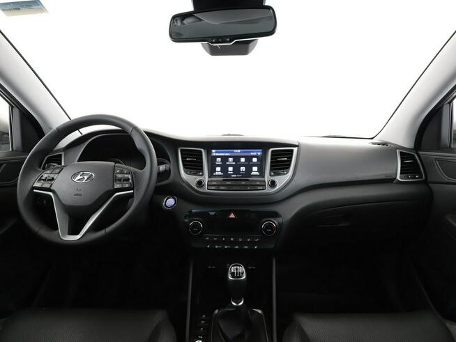 Hyundai Tucson skóra navi PDC grzane fotele tempomat klima-auto.
