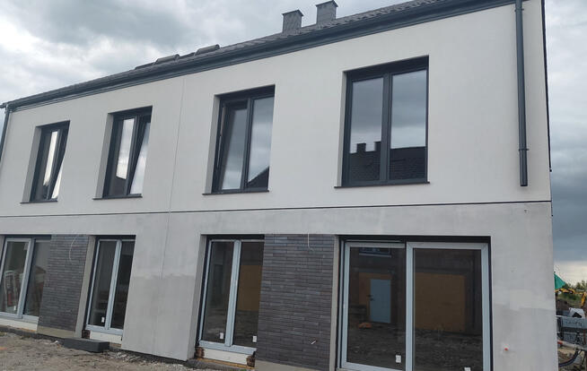 Dom w zab. bliźniaczej 105,27m2 +opcj.poddasze 29,30/z pompą ciepła/Iwiny