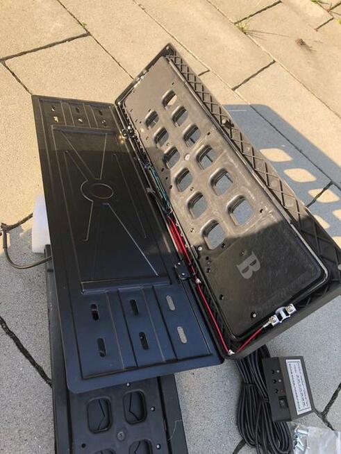 Obrotowe ramki do tablic rejestracyjnych, kręcące ramki