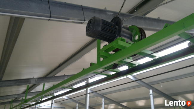 Szynowy zgarniacz obornika