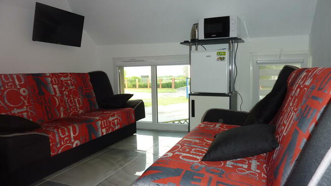 Morze Mielno wczasy domek pokoje jezioro 100 domki kwatery