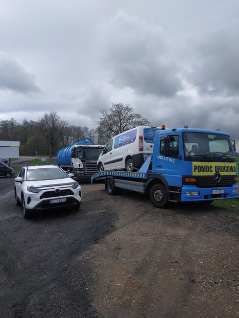 Autolaweta laweta transport aut maszyn rol pomoc drogowa