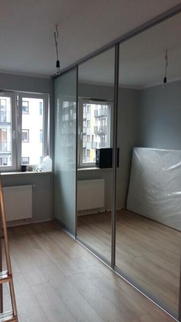 DRZWI PRZESUWNE- Profesjonalny montaż i doradztwo