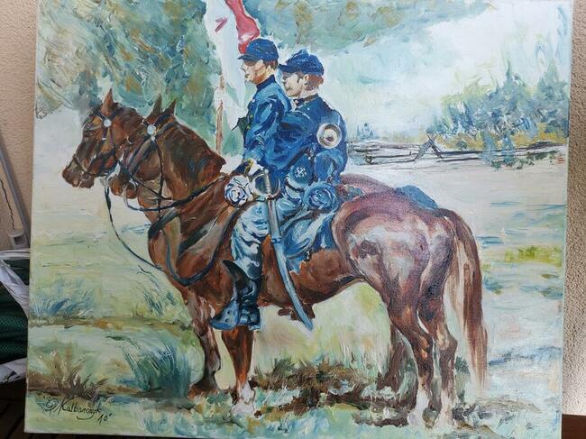 Kawalerzyści na koniach