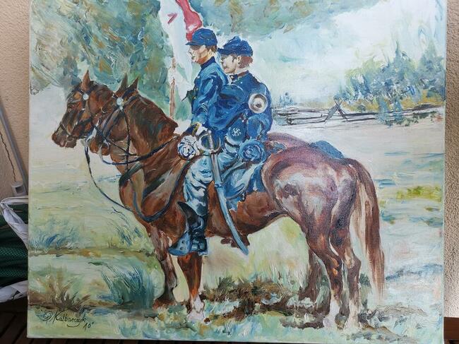 Kawalerzyści na koniach