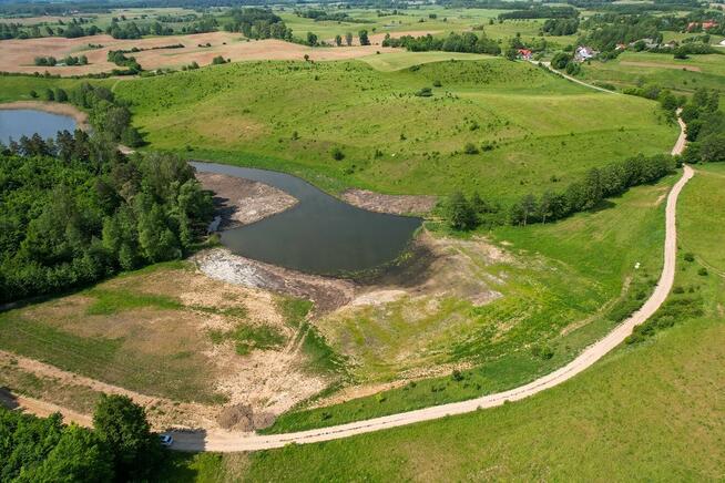 Działki z linią brzegową i widokiem na jez. Rogale