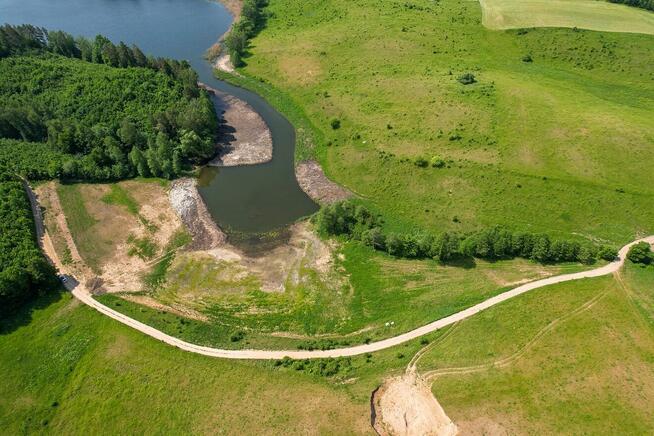 Działki z linią brzegową i widokiem na jez. Rogale