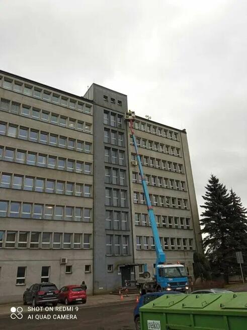 Usługi podnośnikiem koszowym - zwyżka, wysokość robocza 27m
