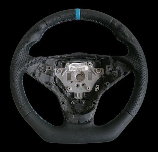 Kier Center - obszywanie i modyfikacja owalu kierownic, dywa