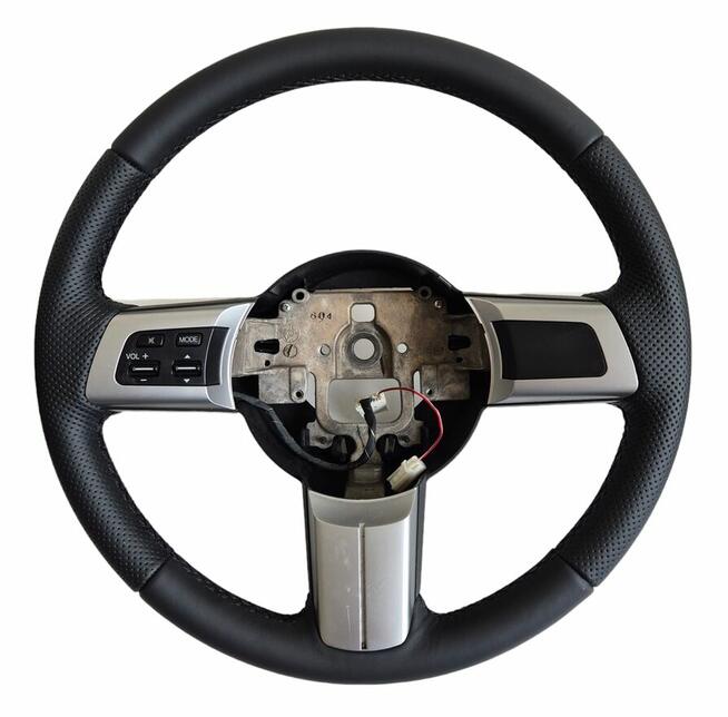 Kier Center - obszywanie i modyfikacja owalu kierownic, dywa