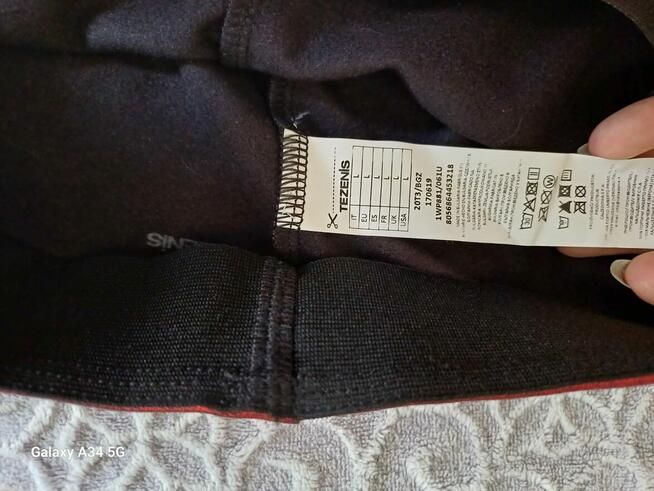 Błyszczące legginsy, L