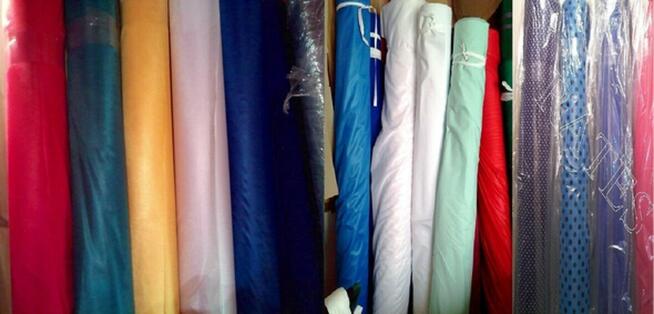 Fartuchy stylonowe zakładane przez głowę. Rates Producent