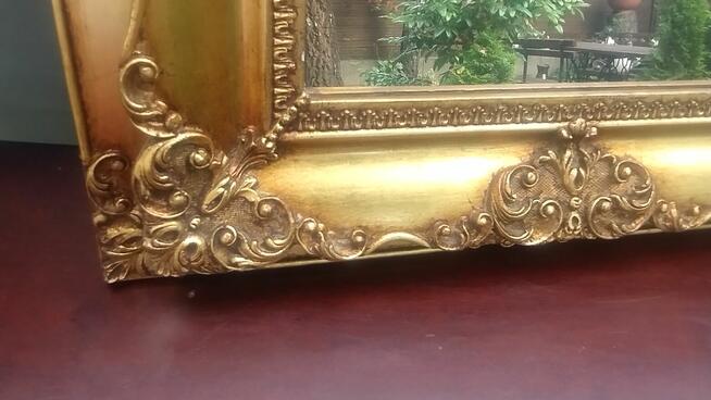 Piękne stare lustro w podwójnej ramie