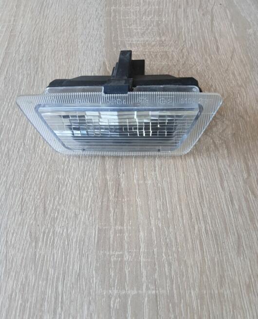 LAMPKA TABLICY REJESTRACYJNEJ OPEL ASTRA G II Lampa