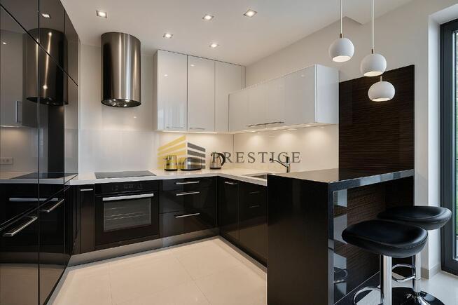 Ekskluzywny Apartament z Prywatnym Patio – Prestiż